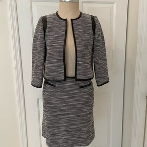 A line skirt three-quarter sleeve jacket, never goes out of style! Calvin Klein